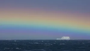 Rainbow over iceberg, South Georgia in the South Atlantic Ocean Rainbow over iceberg, South Georgia in the South Atlantic Ocean