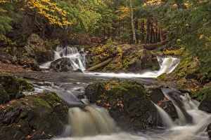 Rapids and autumn leaves along the Little Carp River in Porcupine Mountains Wilderness Rapids and autumn leaves along the Little Carp River in Porcupine Mountains Wilderness