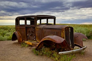 Rusty old 1931 Studebaker at the Painted Forest National Park, Arizona Rusty old 1931 Studebaker at the Painted Forest National Park, Arizona