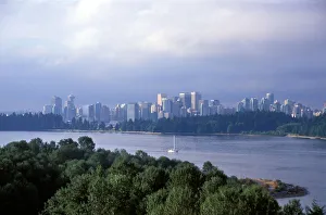 Sail boat on the river in front of the skyline of the city of Vancouver, British Columbia Sail boat on the river in front of the skyline of the city of Vancouver, British Columbia