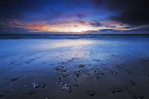 Sand and surf at dusk, San Buenaventura State Beach, Ventura, California USA Sand and surf at dusk, San Buenaventura State Beach, Ventura, California USA