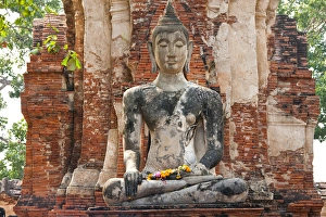 Seated Buddha statue at the temple of Wat Mahatat in Ayutthaya near Bangkok, Thailand Seated Buddha statue at the temple of Wat Mahatat in Ayutthaya near Bangkok, Thailand