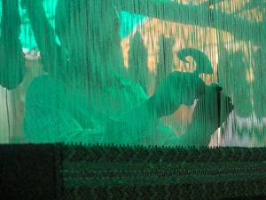 Silhouette of man operating handloom machine in Jaipur, Rajasthan, India Silhouette of man operating handloom machine in Jaipur, Rajasthan, India