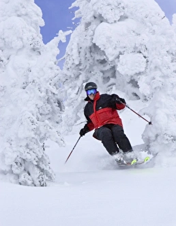 Skier enjoying a fine powder day on Big Moutain Resort near Whitefish Montana (MR) Skier enjoying a fine powder day on Big Moutain Resort near Whitefish Montana (MR)