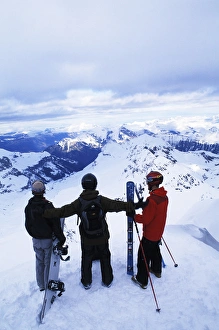 Skiers on top of the Swiss Alps at Schilthorn in Murren, Switzerland Skiers on top of the Swiss Alps at Schilthorn in Murren, Switzerland
