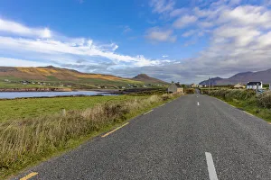 Slea Head Drive leads into small town of Ballyferriter on the Dingle Peninsula, Ireland Slea Head Drive leads into small town of Ballyferriter on the Dingle Peninsula, Ireland