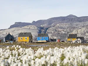 Small fishing village Ikerasak on Ikerask island in the Uummannaq Fjord System, Greenland Small fishing village Ikerasak on Ikerask island in the Uummannaq Fjord System, Greenland