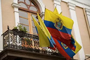 South America, Ecuador, Pichincha province, Quito. National flags of Ecuador hang
