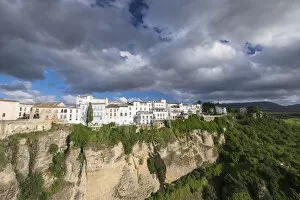 Spain, Andalusia. Ronda perches on the rugged defensible limestone cliffs