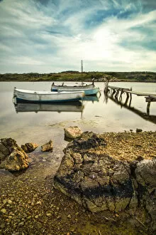 Images Dated 23rd August 2019: Spain, Menorca. Boats docked on a lake