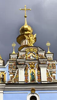 St. Michael's Golden-Domed Monastery, Steeple Spire Facade, Kiev, Ukraine. Saint Michael's is a functioning Greek Orthodox Monastery in Kiev. The monastery was created in the 1100's but was destroyed by the Soviet Union in the 1930's