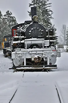 Steam engine train on tracks in town of Snoqualmie, Washington State Steam engine train on tracks in town of Snoqualmie, Washington State
