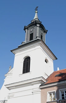 Steeple of church in Old Town for tourists Central Warsaw Poland Freta Street Steeple of church in Old Town for tourists Central Warsaw Poland Freta Street