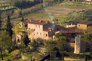 Stone buildings perch on the vineyard-covered hills above the rural town of Lamole Stone buildings perch on the vineyard-covered hills above the rural town of Lamole