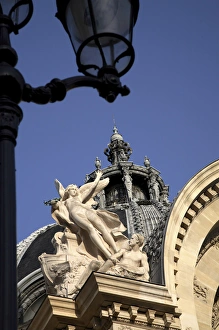 The stone sculptures decorating the roof of Petit Palais. Paris. France The stone sculptures decorating the roof of Petit Palais. Paris. France
