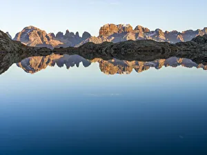 The summits of Brenta mountain range are reflected in Lago Nero The summits of Brenta mountain range are reflected in Lago Nero