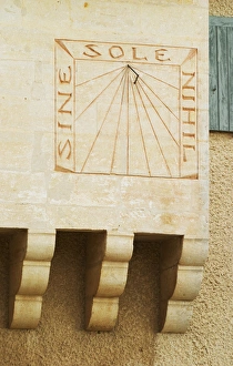 The sun dial with the carved stone inscription: Sine Sole Nihil (without the sun there is nothing) The sun dial with the carved stone inscription: Sine Sole Nihil (without the sun there is nothing)