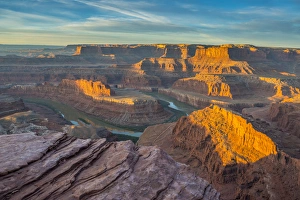 Sunrise at Dead Horse Point State Park, view of Colorado River and Canyonlands National Sunrise at Dead Horse Point State Park, view of Colorado River and Canyonlands National