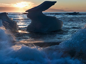 Sunrise and iceberg formation on the beach at Jokulsarlon, Iceland Sunrise and iceberg formation on the beach at Jokulsarlon, Iceland