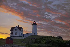 Sunrise skies over Nubble aka Cape Neddick Lighthouse in York, Maine, USA Sunrise skies over Nubble aka Cape Neddick Lighthouse in York, Maine, USA