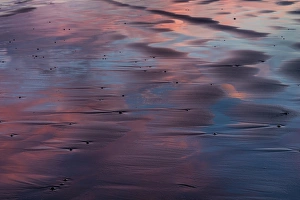 Sunser reflection in the black sand at Vestrahorn Mountain in winter near Hofn, Iceland Sunser reflection in the black sand at Vestrahorn Mountain in winter near Hofn, Iceland