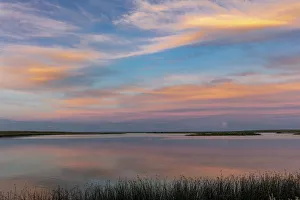 Sunset clouds reflection at Medicine Lake National Wildlife Refuge, Montana, USA Sunset clouds reflection at Medicine Lake National Wildlife Refuge, Montana, USA