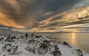 Sunset over lake Myvatn in the highlands of Iceland during winter with lava rock Sunset over lake Myvatn in the highlands of Iceland during winter with lava rock