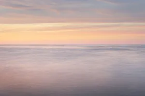 Sunset over Lake Superior seen from beach at Whitefish Point, Upper Peninsula, Michigan Sunset over Lake Superior seen from beach at Whitefish Point, Upper Peninsula, Michigan