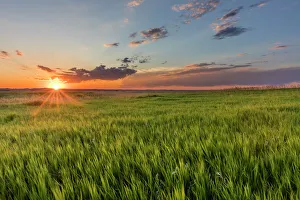 Sunset over prairie grasslands in Badlands National Park, South Dakota, USA Sunset over prairie grasslands in Badlands National Park, South Dakota, USA
