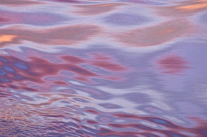 Sunset reflections; the movement of the water caused by the ship created this amazing mix of light Sunset reflections; the movement of the water caused by the ship created this amazing mix of light