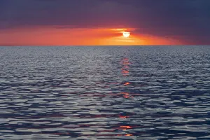 Sunset sky with clouds over ocean seen from La Boca, Cuba Sunset sky with clouds over ocean seen from La Boca, Cuba