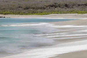 Surf pattern washing up on white sandy beach, Espanola Island, Galapagos Islands, Ecuador Surf pattern washing up on white sandy beach, Espanola Island, Galapagos Islands, Ecuador