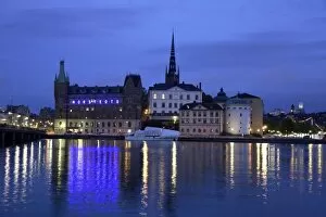 Images Dated 7th September 2008: Sweden. Stockholm. The night view of Riddarholmen Island with the black spire of Riddarholmskyrkan