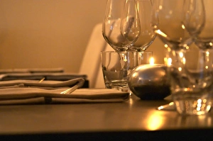 Table set with napkins wine glasses and forks at the trendy restaurant Beluga Table set with napkins wine glasses and forks at the trendy restaurant Beluga