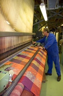 Textile loom in the Garnier-Thiebaut factory at Gerardmer, France Textile loom in the Garnier-Thiebaut factory at Gerardmer, France
