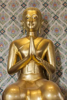 Thailand, Bangkok. Chinatown, Wat Traimit, home of the Golden Buddha, small Buddha statue Thailand, Bangkok. Chinatown, Wat Traimit, home of the Golden Buddha, small Buddha statue