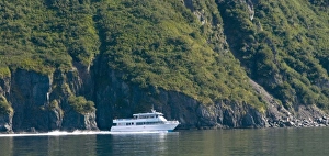 Tour boat in Aialik Bay in Kenai Fjords National Park Alaska Tour boat in Aialik Bay in Kenai Fjords National Park Alaska