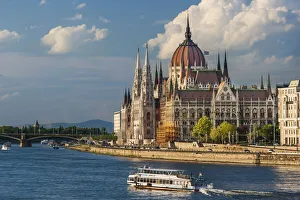 Tour boat passes Hungary's Parliament, built between 1884-1902 is the country' Tour boat passes Hungary's Parliament, built between 1884-1902 is the country'