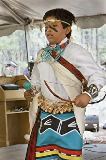 Traditional Hopi dancer demonstrating a Hopi hunting dance with bow and quiver during Traditional Hopi dancer demonstrating a Hopi hunting dance with bow and quiver during