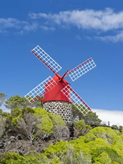 Traditional windmill near Sao Joao. Pico Island, an island in the Azores in the Atlantic Traditional windmill near Sao Joao. Pico Island, an island in the Azores in the Atlantic
