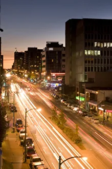 Traffic streaks by on a busy street in Vancouver, BC, Canada Traffic streaks by on a busy street in Vancouver, BC, Canada