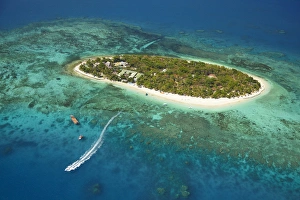 Treasure Island Resort and boat, Mamanuca Islands, Fiji, South Pacific - aerial Treasure Island Resort and boat, Mamanuca Islands, Fiji, South Pacific - aerial