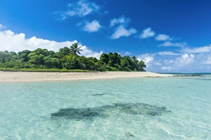 Turquoise water around a little island with a white sand beach in HaAA´apai, Haapai Turquoise water around a little island with a white sand beach in HaAA´apai, Haapai