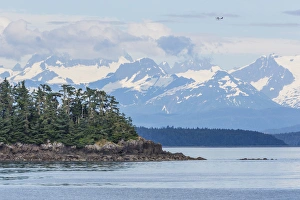 USA, Alaska. Air taxi flies over mountain landscape USA, Alaska. Air taxi flies over mountain landscape