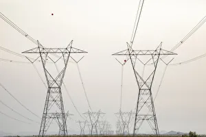 USA, Arizona. Converging transmission towers and power lines USA, Arizona. Converging transmission towers and power lines