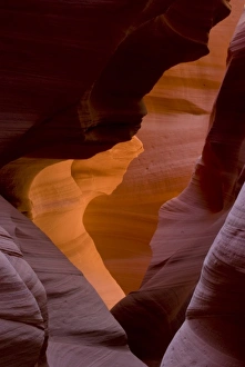 USA, Arizona, Navajo Tribal Lands. Reflected sunlights creates amber walls in Slot Canyon USA, Arizona, Navajo Tribal Lands. Reflected sunlights creates amber walls in Slot Canyon