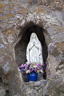 USA, Arizona. Statue of the Virgin Mary at Mission San Xavier del Bac, a historic USA, Arizona. Statue of the Virgin Mary at Mission San Xavier del Bac, a historic