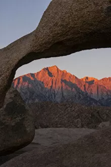 Images Dated 14th September 2012: USA, California, Alabama Hills. Mountains seen through Mobius Arch at sunrise. Credit as