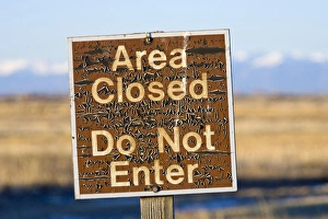 USA, Colorado. An aged warning sign in the Monte Vista National Wildlife Refuge. Credit as: Fred J USA, Colorado. An aged warning sign in the Monte Vista National Wildlife Refuge. Credit as: Fred J