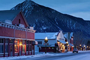 Skiing Collection: USA, Colorado, Crested Butte, historic buildings along Elk Avenue, winter, dawn
